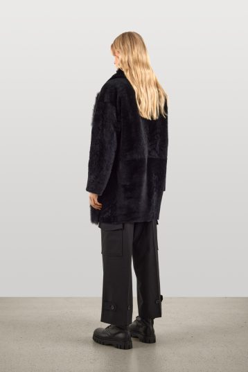 Black Shearling Taper Coat | Womens Luxury Shearling | Gushlow & Cole | model full length back side