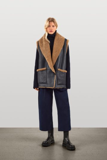 Navy Patch Pocket Shearling Gilet | Womens Luxury Shearling | Gushlow & Cole | model gilet done up front