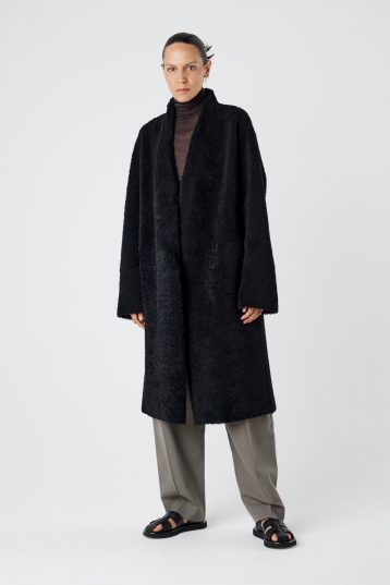 Collarless Black Shearling Wrap Coat | Womens | Gushlow & Cole - model length leather out coat front