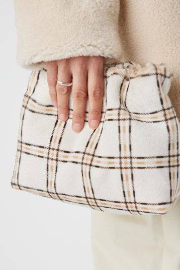 Check Print Soft Shearling Clutch Bag | Womens | Gushlow & Cole- close crop model holding bag