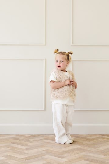 Cream Kids Curly Toscana Shearling Gilet | Kids | Gushlow & Cole - model inside gilet closed