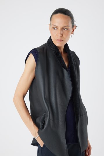 Natural Edge Graphite Black Mid Length Shearling Gilet - model crop reverse