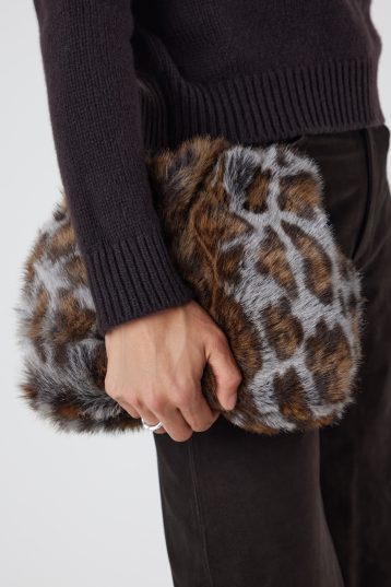 Ocelot Print Soft Shearling Clutch Bag | Womens | Gushlow & Cole - model holding crop in