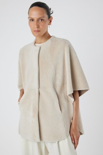 White Collarless Shearling Cape | Womens | Gushlow & Cole- model crop front