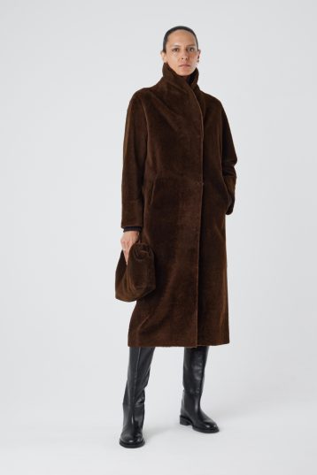 Longline Neat Shearling Shawl Coat in Brown | Womens | Gushlow & Cole- full length coat on model closed