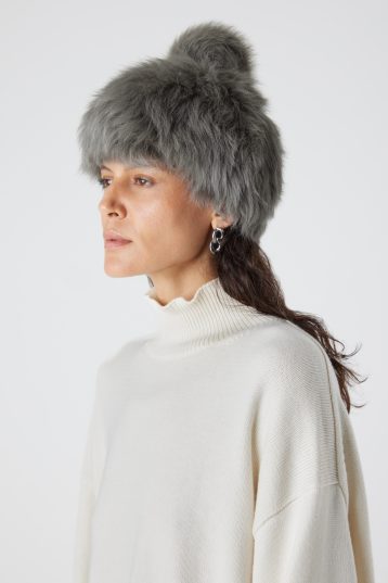 Storm Green Shearling Bobble Hat | Womens | Gushlow & Cole - model wearing hat